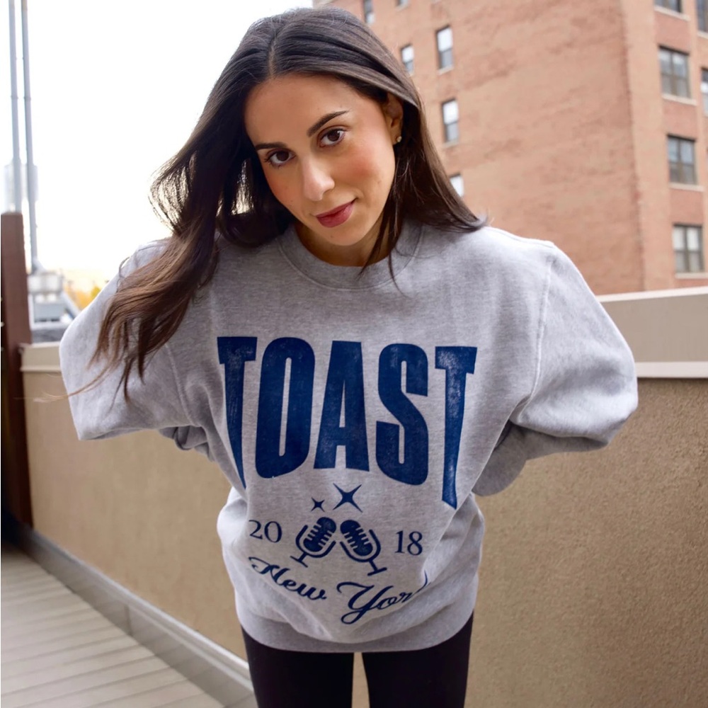 The Toast Podcast Merch sweatshirt